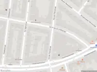 Ambulance met grote spoed naar de Van der Palmstraat in Rotterdam