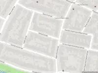 Ambulance met gepaste spoed naar de Dennenstraat in Haarlem