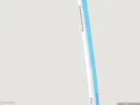 Politie met grote spoed naar de Onderdendamsterweg in Warffum vanwege voertuigen te water