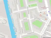 Ambulance met grote spoed naar de Luzacstraat in Amsterdam