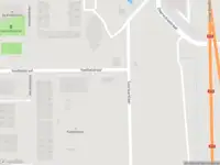 Ambulance met gepaste spoed naar de Voetbalstraat in Amsterdam