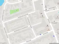 Ambulance met grote spoed naar de Burgemeester Swartstraat in Oostzaan