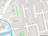 Ambulance met gepaste spoed naar de De Genestetstraat in Leiden