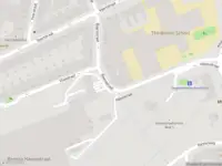 Ambulance met grote spoed naar de Baarsstraat in Amsterdam