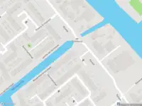 Ambulance met grote spoed naar de Margaretha Simonskade in Leiden