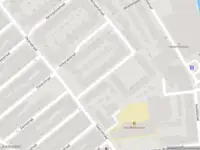 Ambulance met gepaste spoed naar de Grevelingenstraat in Schiedam