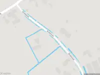 Brandweer met gepaste spoed naar de Broekstraat in Uden vanwege een buitenbrand