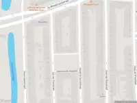 Ambulance met grote spoed naar de Van der Poelstraat in Rotterdam