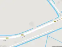 Politie naar de Schrijversdijk in Oostvoorne vanwege voertuigen te water