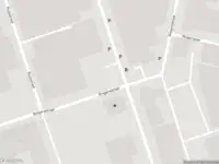 Ambulance met gepaste spoed naar de Ringersstraat in Schiedam