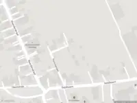 Brandweer met grote spoed naar de Pelmolenlaan in Oostwold vanwege gebouwbrand