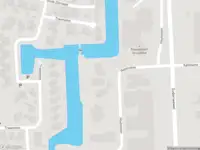 Ambulance met grote spoed naar de Houtmolen in Makkum