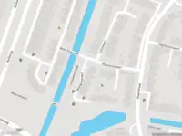 Brandweer met gepaste spoed naar de Weegbreevaart in Zoetermeer vanwege wateroverlast