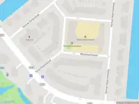 Ambulance met grote spoed naar de Messchaertstraat in Amsterdam