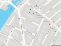 Ambulance met gepaste spoed naar de Ouddorpsestraat in Schiedam