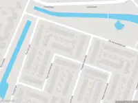 Ambulance met gepaste spoed naar de Van Eedenstraat in Ridderkerk