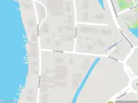 Ambulance met gepaste spoed naar de Smidsweg in Maasdam