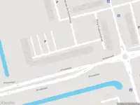 Ambulance met gepaste spoed naar de Edmond Hellenraadstraat in Rotterdam