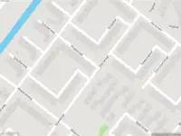 Ambulance met grote spoed naar de Plutostraat in Amsterdam