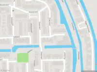 Ambulance met grote spoed naar de Praamwerf in Gouda