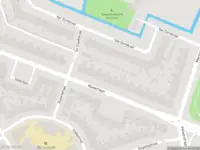 Ambulance met grote spoed naar de Van Dortstraat in Haarlem
