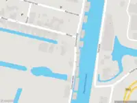 Ambulance met gepaste spoed naar de Zuidervaartdijk in Krommenie