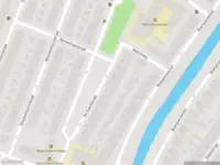 Ambulance met gepaste spoed naar de De Quackstraat in Rotterdam