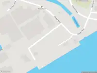 Brandweer met gepaste spoed naar de Maasdijk in Wessem vanwege stormschade