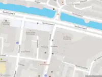 Ambulance met gepaste spoed naar de Spuiboulevard in Dordrecht