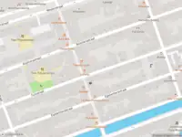 Ambulance met grote spoed naar de Anjeliersstraat in Amsterdam