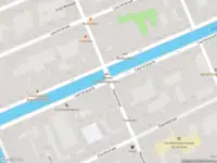 Ambulance met grote spoed naar de Elandsgracht in Amsterdam