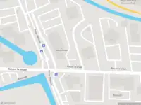 Ambulance met grote spoed naar de Rivium 1e straat in Capelle aan den IJssel