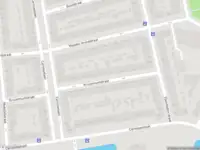 Ambulance met grote spoed naar de Kruizemuntstraat in Rotterdam