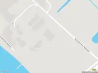 Brandweer met grote spoed naar de Munnikenlandse Maaskade in Poederoijen vanwege middelgrote brand