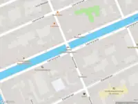 Ambulance met grote spoed naar de Elandsgracht in Amsterdam