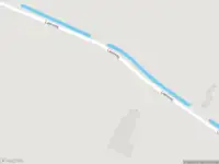 Brandweer met gepaste spoed naar de Laanweg in Overschild