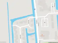 Ambulance met grote spoed naar de Ganzehof in Midwoud