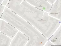 Ambulance met grote spoed naar de Dutrystraat in Haarlem