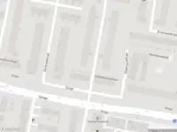 Ambulance met grote spoed naar de Schuddebeursstraat in Rotterdam