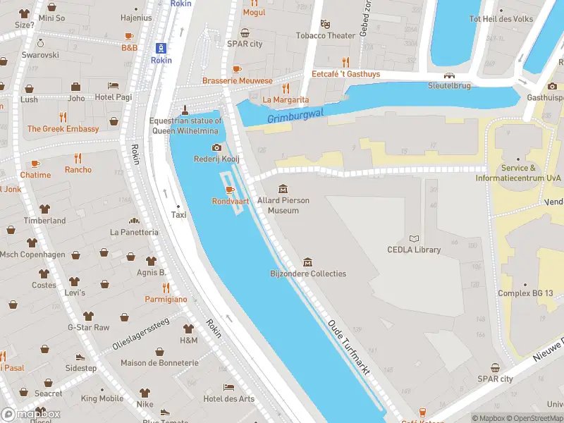 Brandweer met grote spoed naar de Oude Turfmarkt in Amsterdam vanwege personen te water