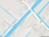 Ambulance met grote spoed naar de Haarlemmertrekvaart in Voorhout