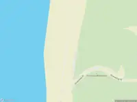 Ambulance met gepaste spoed naar de Strand Egmond-Binnen in Egmond-Binnen