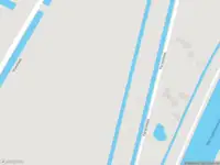 Ambulance met gepaste spoed naar de Vlietskade in Arkel