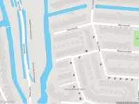 Ambulance met gepaste spoed naar de Harreweg in Schiedam