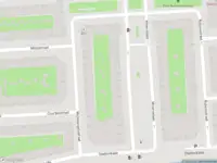 Ambulance met grote spoed naar de Courbetstraat in Amsterdam