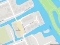 Ambulance met grote spoed naar de Zonnedauw in Oostzaan