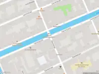 Ambulance met grote spoed naar de Elandsgracht in Amsterdam