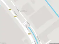 Ambulance met grote spoed naar de Bedrijvenweg in De Kwakel
