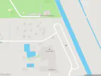 Ambulance met gepaste spoed naar de Basisweg in Weesp