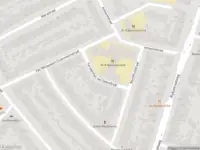 Ambulance met gepaste spoed naar de Vorsterman van Oyenstraat in Haarlem